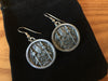 Time Traveling Token Earrings & Pendants Available!